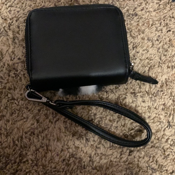 Black pleather zip/snap small wristlet with fuzzy checkered flag on front - Picture 2 of 5